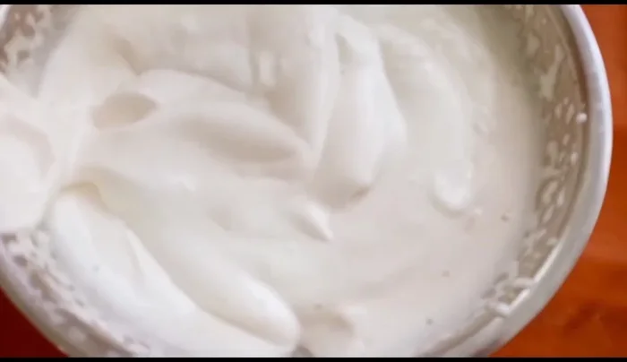 Gently fold the gelatin mixture into the whipped milk.