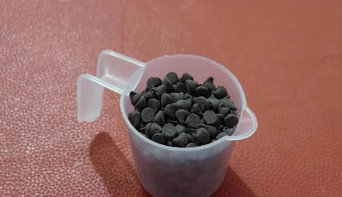 Melt semisweet chocolate (either in the microwave or a double boiler).