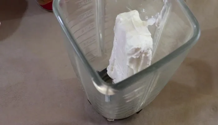 In a blender, combine cream cheese, half cream, evaporated milk, condensed milk, and lemon juice. Blend until smooth.
