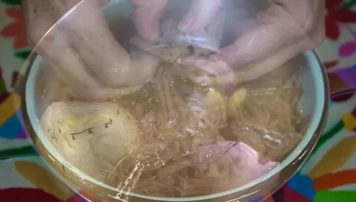 Once the meat is cold, shred it.