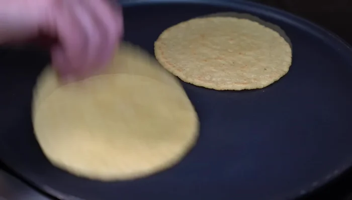 Serve: Serve hot with warm corn tortillas, refried beans, and red rice.