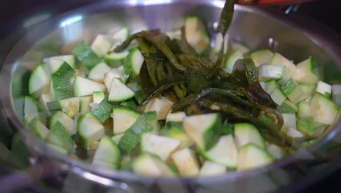 Add the zucchini and poblano strips; season with salt. Cook for 5 minutes over medium heat.