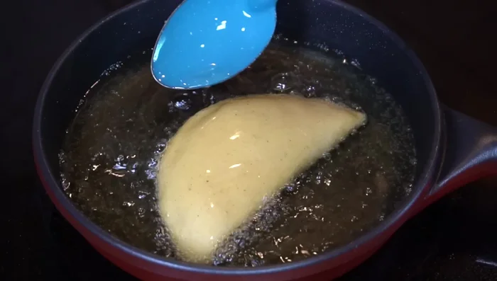 Fry the quesadillas: Carefully place quesadillas in hot oil and fry until golden brown on both sides. Drain on a colander lined with absorbent paper.