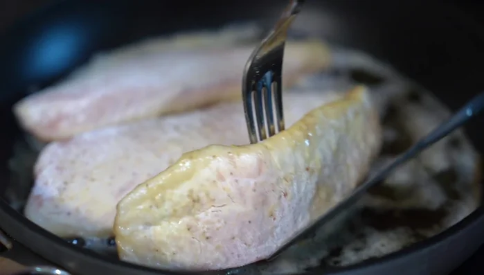 Pan-fry tilapia fillets for 4-5 minutes per side, until golden brown. (290.639)