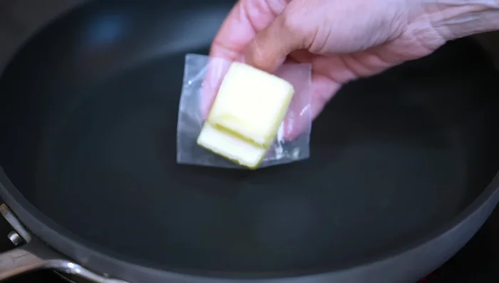 Melt butter and olive oil in a pan. Sauté onion and poblano pepper for 4 minutes.