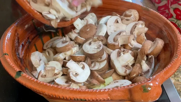 Add the mushrooms and season with a little salt. Cook for another 6 minutes.