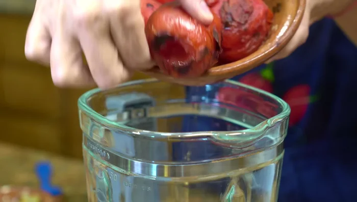 Blend roasted tomatoes, onion, garlic, and jalapeños (without seeds) with a little water until desired consistency is reached. Don't over-blend for a textured sauce.