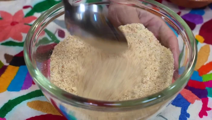 Bread chicken breasts with seasoned breadcrumbs.