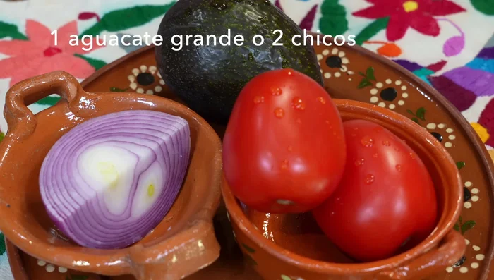 Prepare avocado salad: Combine avocado, red onion, tomato, cucumber, and cilantro.