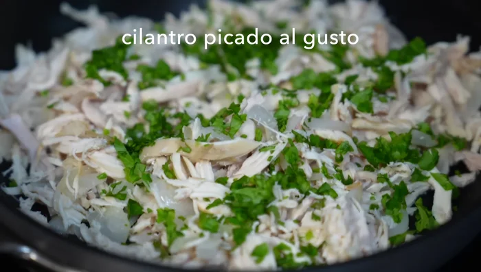 Add chopped cilantro, season generously with salt, and mix well. Remove from heat and let cool.