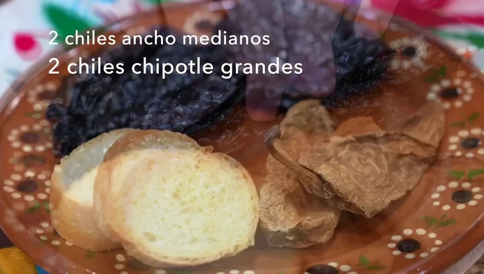 Prepare the sauce: Clean and remove seeds from ancho and chipotle chiles.