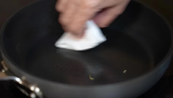 Heat oil in a clean pan over medium heat. Add beaten eggs and cook until the egg is half-cooked.