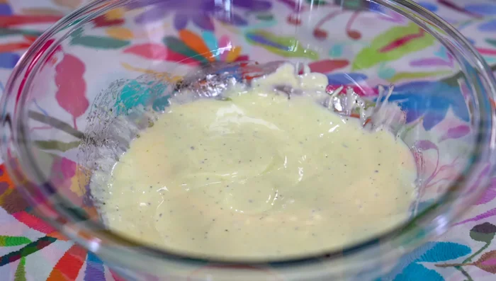Add chopped cilantro to the dressing and mix.