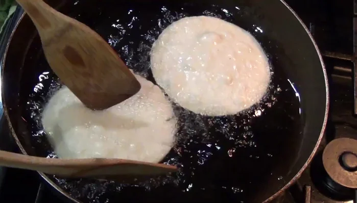 Fry tortillas until golden brown. (489.409)