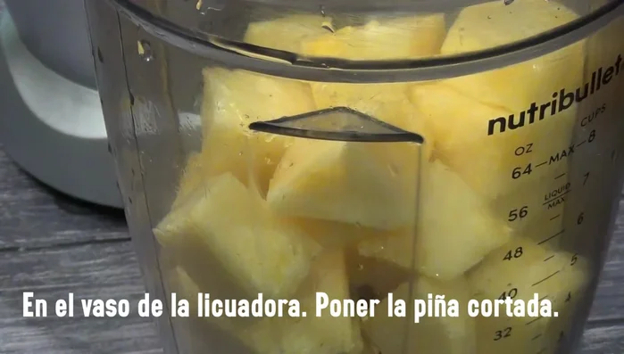 Blend the cooked mixture, pineapple chunks, sugar, and a little water until smooth.