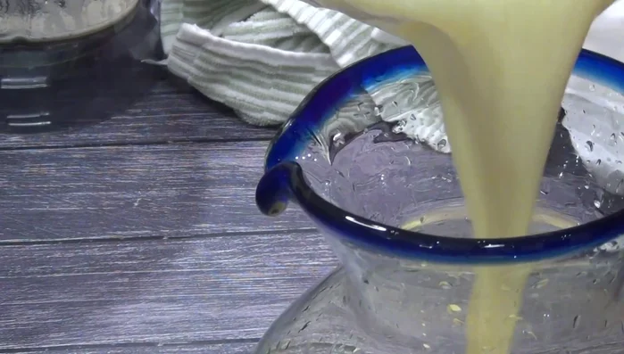 Add the strained mixture to a jug.