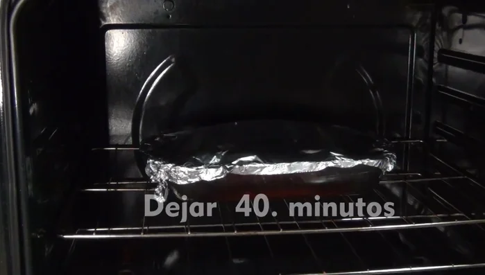 After 40-45 minutes, check the pork loin's doneness. If needed, add more sauce and continue baking until tender.