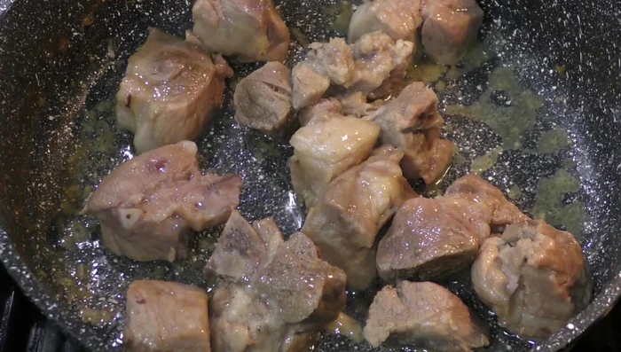 Add the blended sauce to the cooked pork. Brown the pork slightly in the sauce (optional).