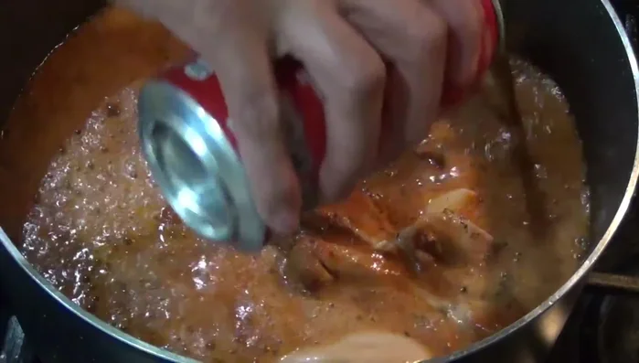 Add Coca-Cola and continue to cook until the sauce thickens.