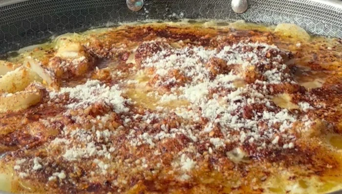 Add parmesan cheese, cayenne pepper, and a little ranch dressing. Mix well.