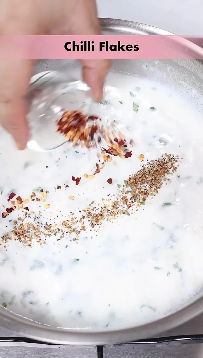 Stir in a cheese slice and mix well.