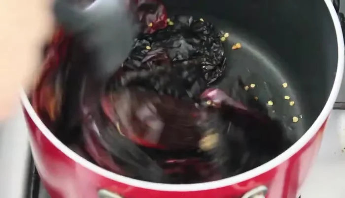 Lightly fry the chilies in oil for 5-10 minutes until softened.