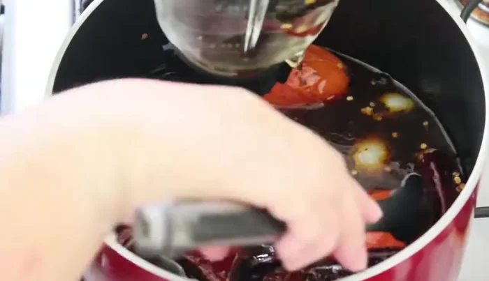 Blend the mixture until smooth. Strain the mixture to remove solids.