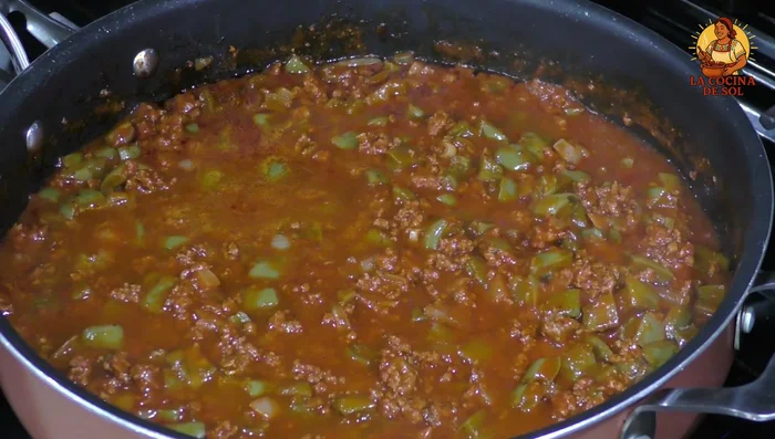 Add the cooked beans (and a little broth if needed), salt, and chopped cilantro to the stew. Simmer for 7 minutes.