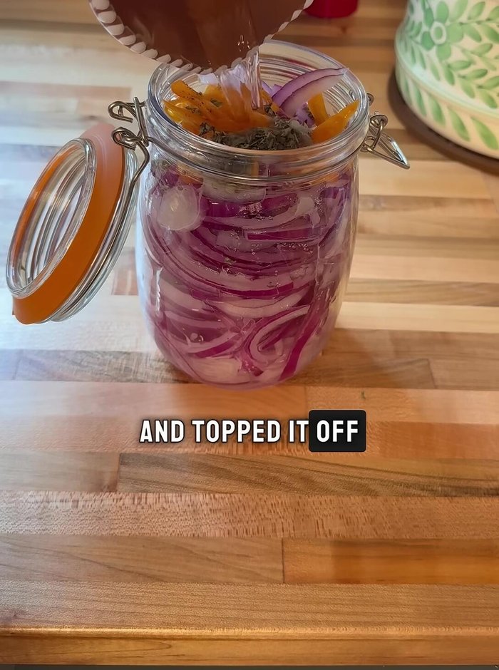 Fill the jar halfway with water and top it off with white vinegar.