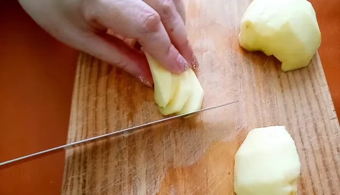 Peel and finely chop the apples.