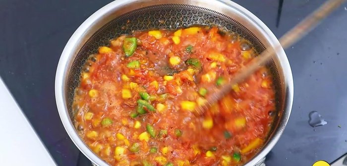Add tomato puree and optional ketchup, simmer for 1-1.5 minutes until a nice red color is achieved.