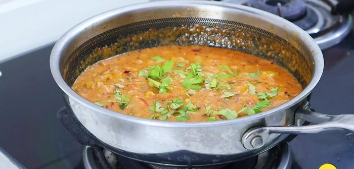 Garnish with coriander and remove from heat.