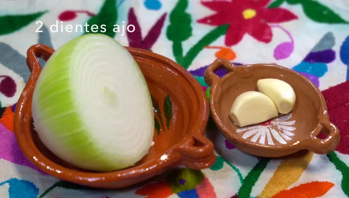 Finely chop garlic and onion.