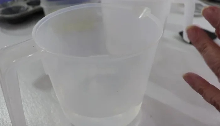 Prepare the grape gelatin: Dissolve grape gelatin in 2 cups boiling water. Let it rest for 10 minutes, then stir and rest for another 10 minutes.