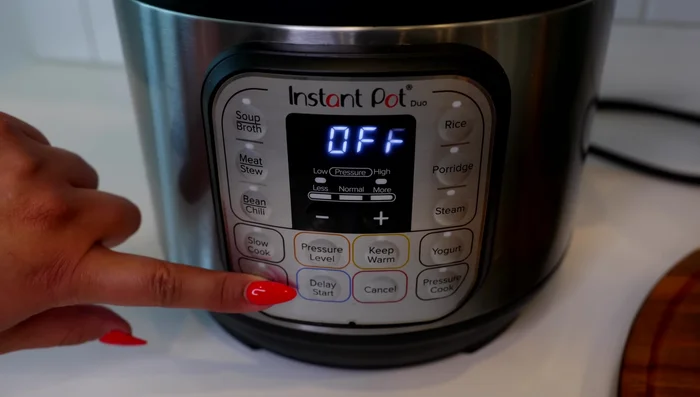 Start by pressing the sauté button on your Instant Pot. Add one tablespoon of ghee (or your favorite oil), two cups of long grain rice, and brown the rice for 3-4 minutes.