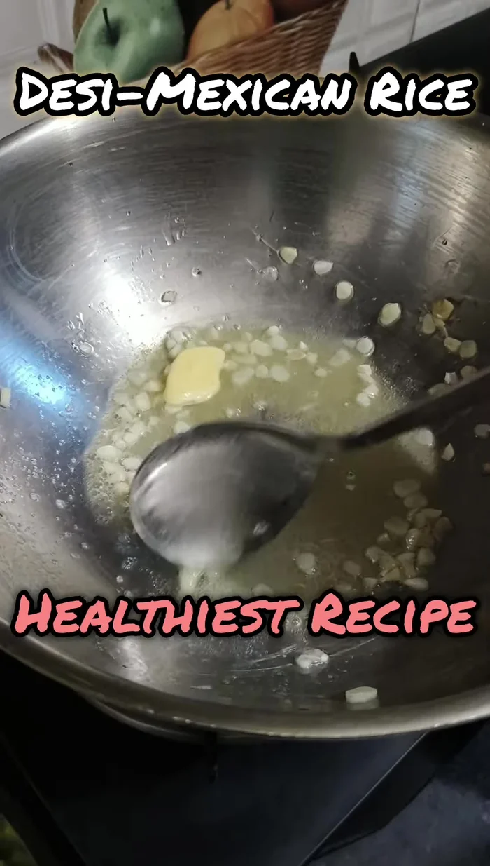 Sauté garlic, boiled corn, and salt in butter.