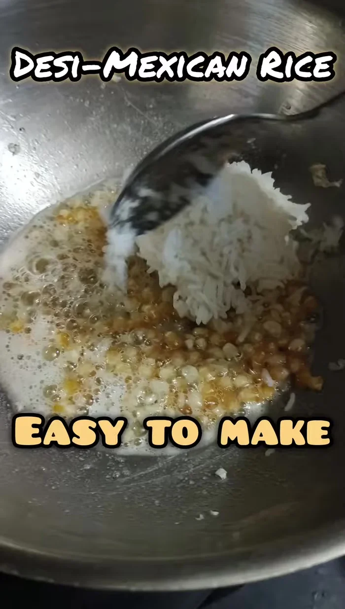 Add boiled rice, oregano, black pepper, and green onion to make Mexican rice.