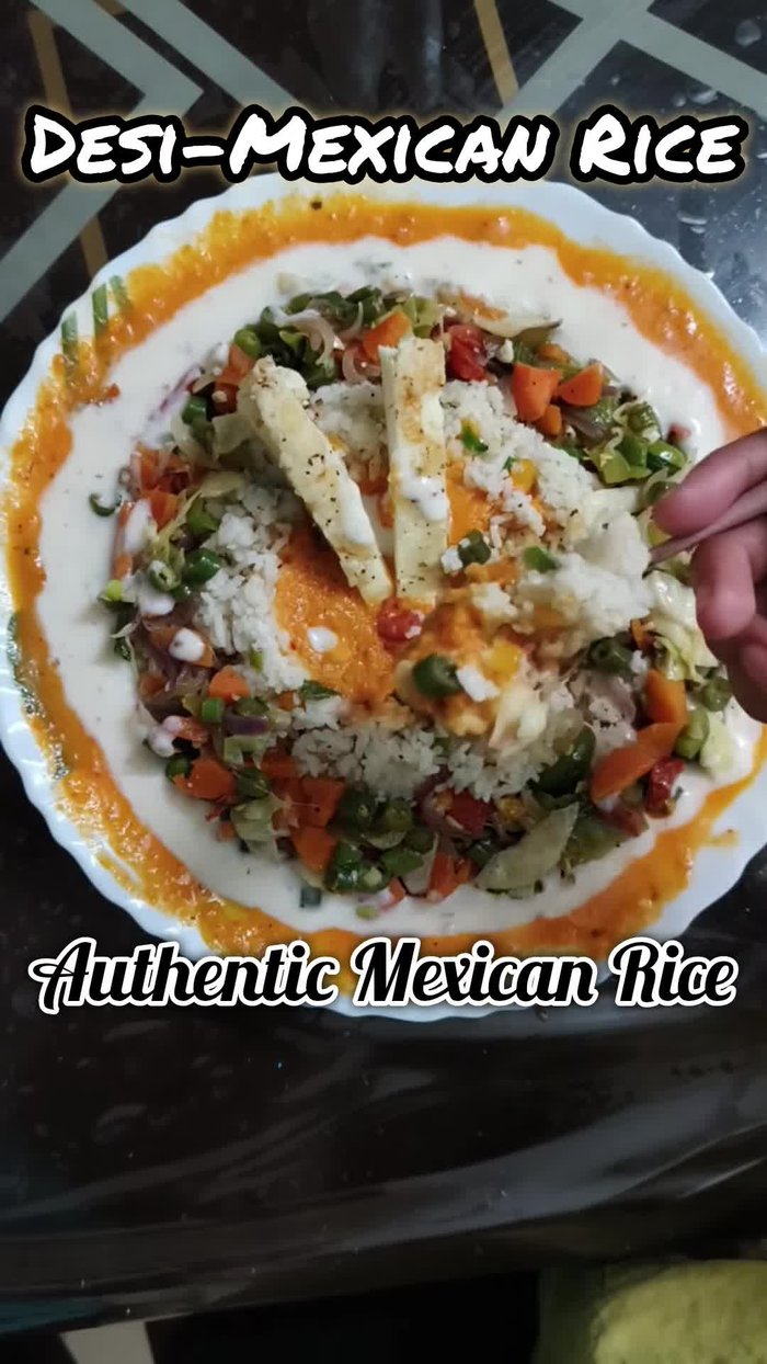 Assemble the platter: Arrange Mexican rice, grilled paneer, sautéed wedges, and both white and red sauces on a platter.