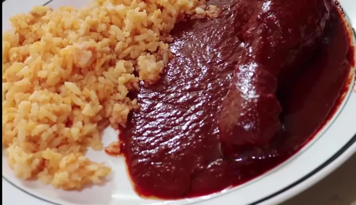 Serve the adobo chicken with rice or other sides.
