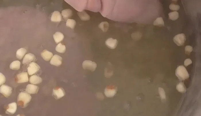 Boil and skim: Bring the mixture to a boil. Skim off the foam (excess blood) that rises to the surface. This prevents the broth from turning dark.