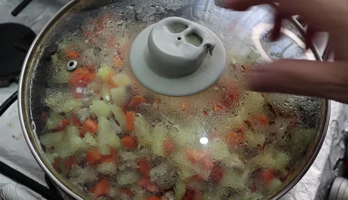 Add the blended tomato mixture to the saucepan. Strain it before adding.
