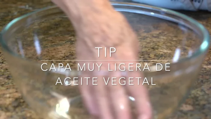 Lightly grease a bowl, place the dough in it, and let it ferment in a warm place.