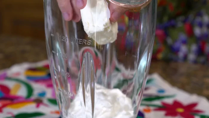 Prepare the cheese sauce: Blend cream cheese, heavy cream (or half-and-half), grated melting cheese, salt (or chicken bouillon powder), and milk until smooth.