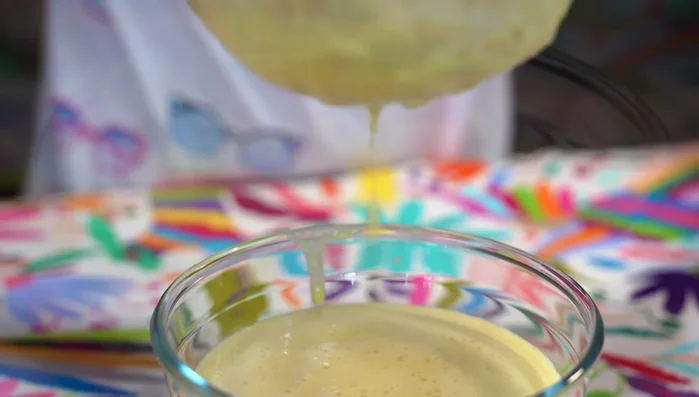 Stir in vanilla extract and yellow food coloring (optional).