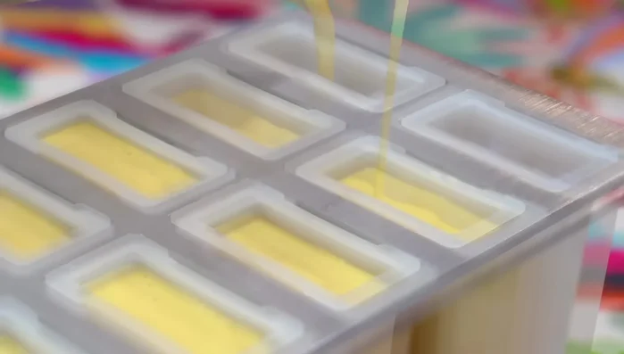 Tap the molds to remove air bubbles, and freeze for 30 minutes to partially solidify.