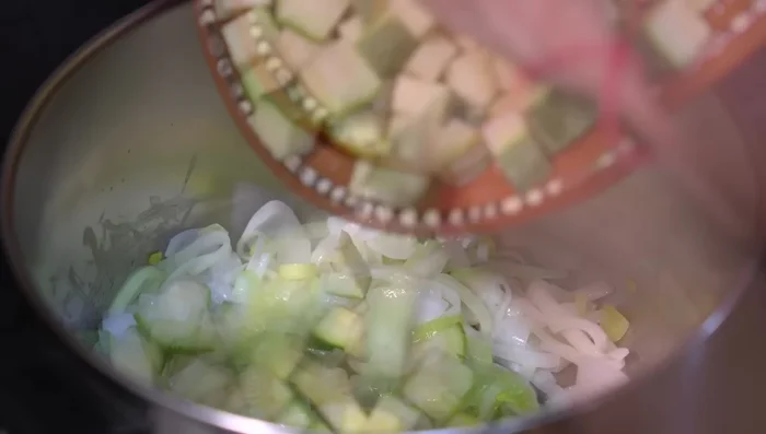 Add zucchini, cilantro, and salt. Cook until zucchini softens (10 minutes).