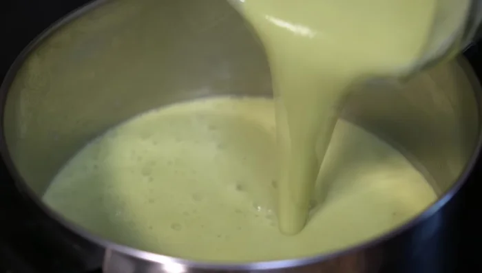 Heat the blended soup on the stove and season with salt or chicken bouillon powder.
