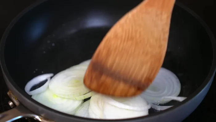Sauté onion for 4 minutes, then add poblano strips and salt. Cook until fragrant (3-4 minutes).