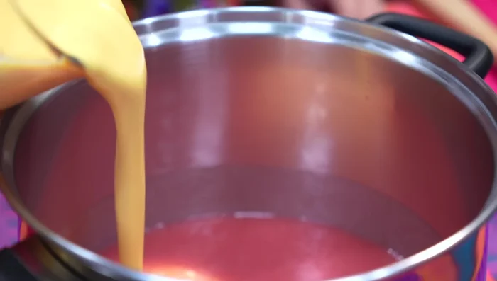 Pour the blended mixture over the strained juice.
