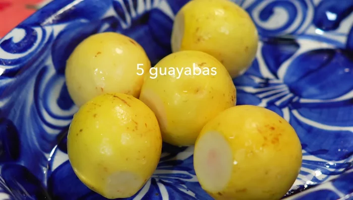 Prepare guavas: remove ends and blend three, chop two for garnish.